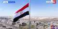 السيسي يرفع العلم على أطول...