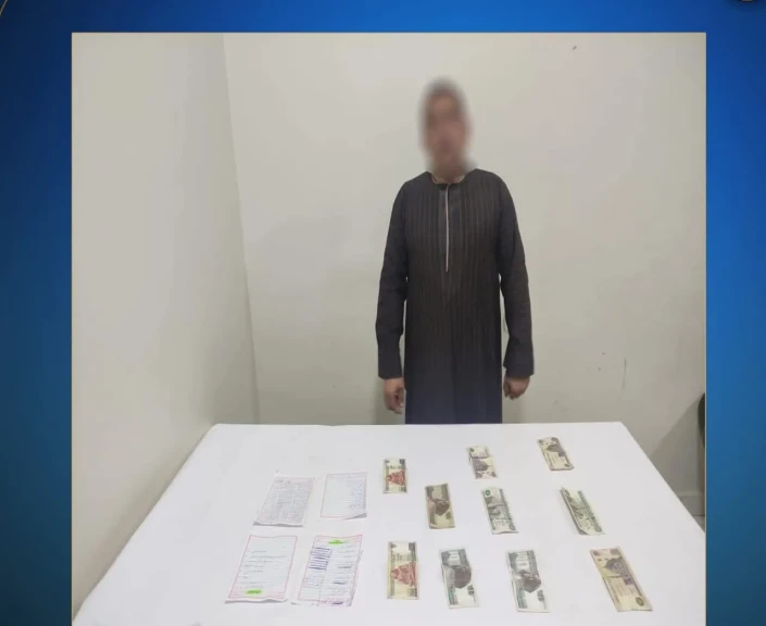 ضبط شخص بمحيط دائرة إنتخابية بالأقصر وبحوزته مبالغ مالية تمهيداً لتوزيعها على الناخبين لدفعهم للتصويت لصالح أحد المرشحين
